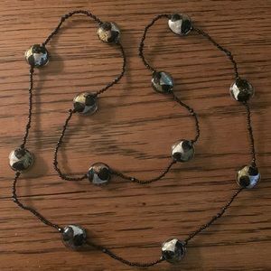 Black seed bead and black silver and gold Murano Glass necklace